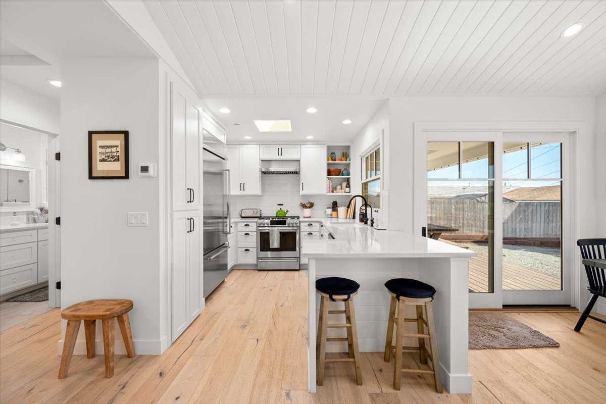 Fully custom and luxury kitchen with bar seating.