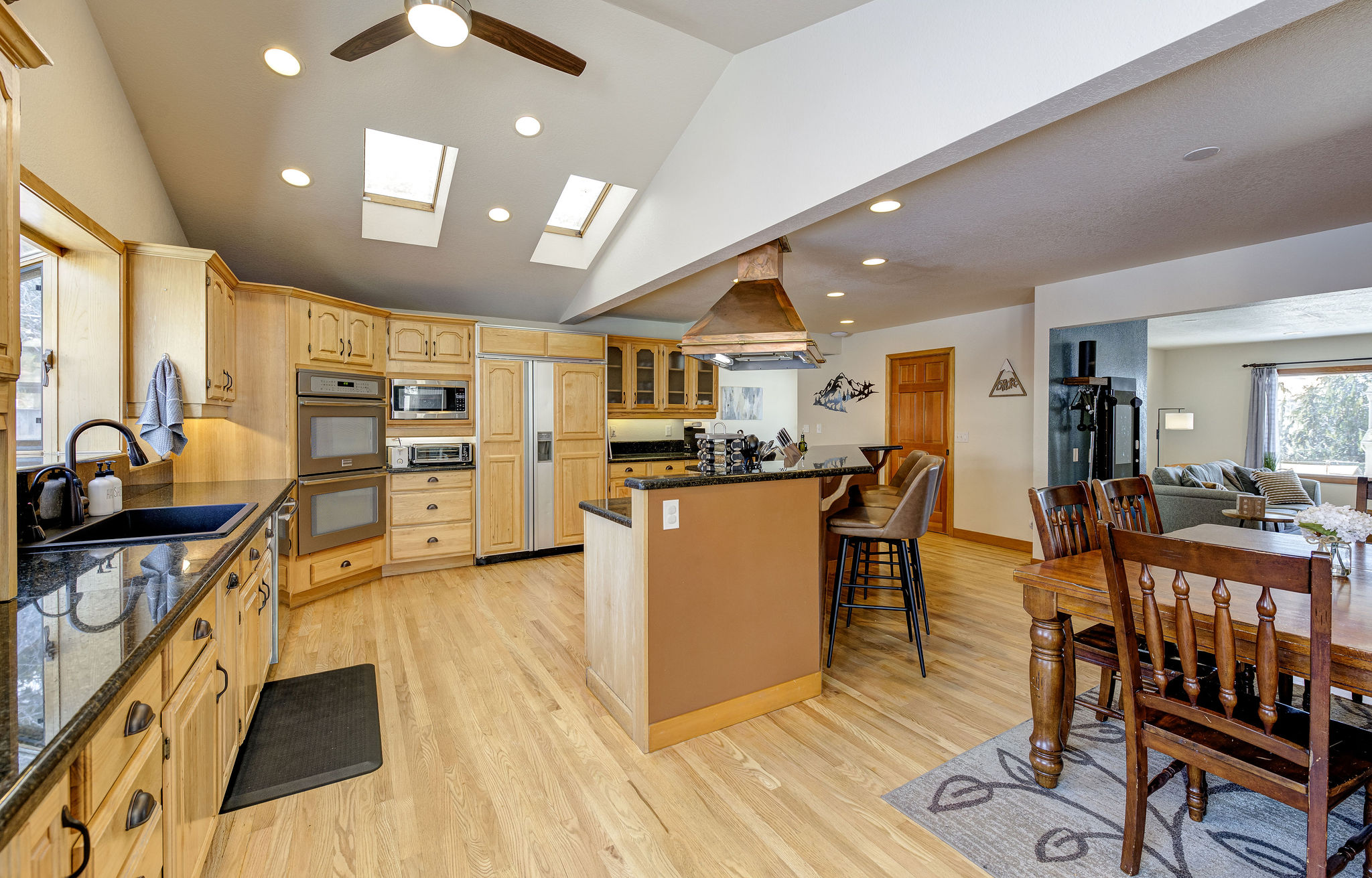 Kitchen with double ovens, Sub Zero fridge and large stove with indoor grill