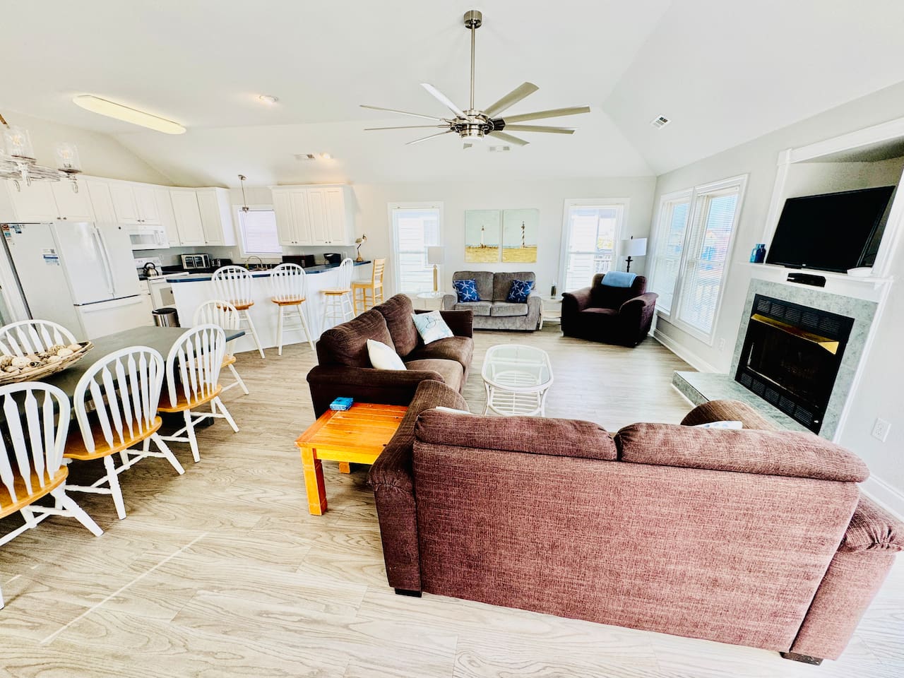 Cozy gathering space, open to kitchen and dining.
