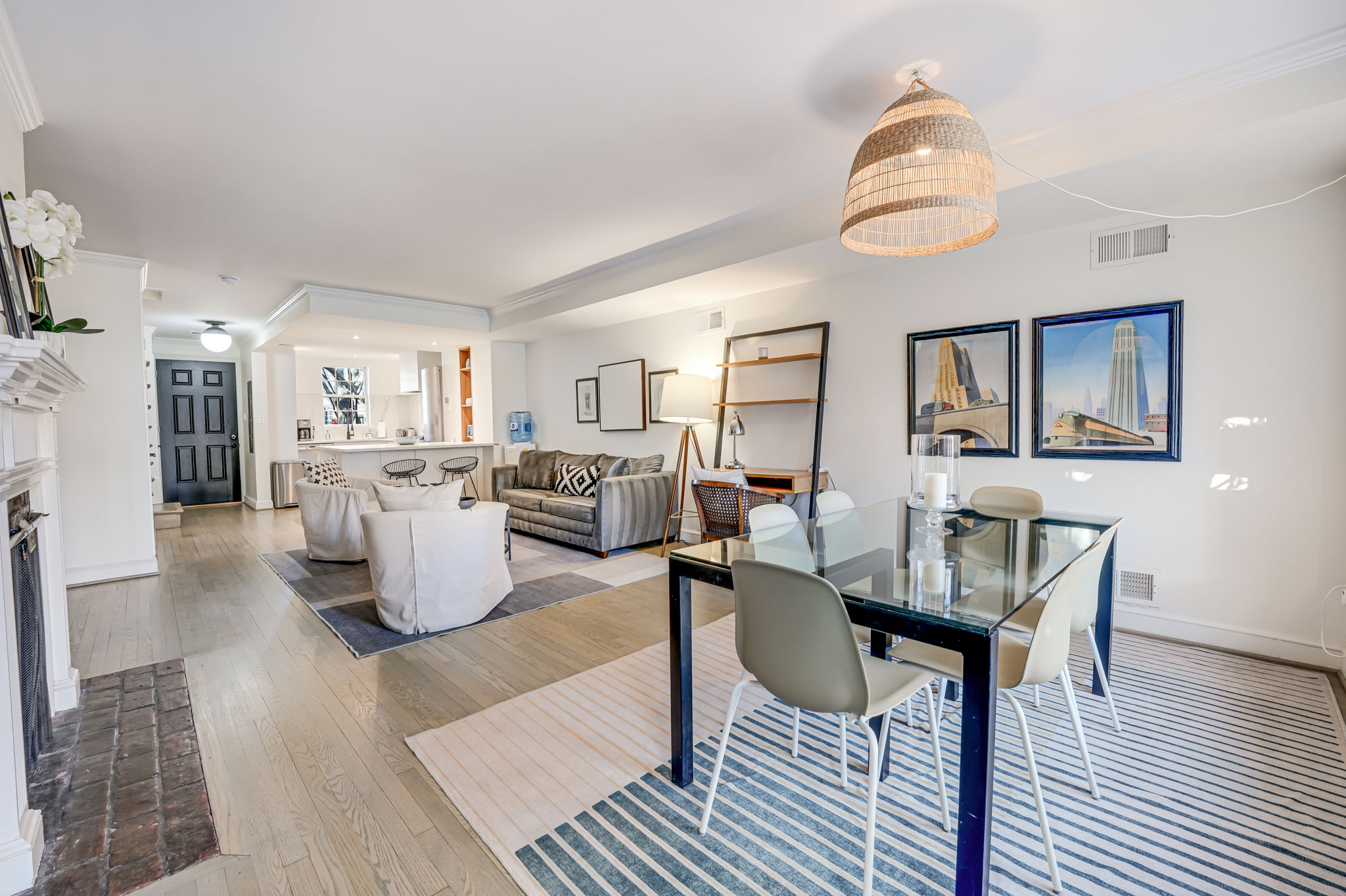 Dining/Living Room: Rear Patio Entrance, Open Concept Kitchen.