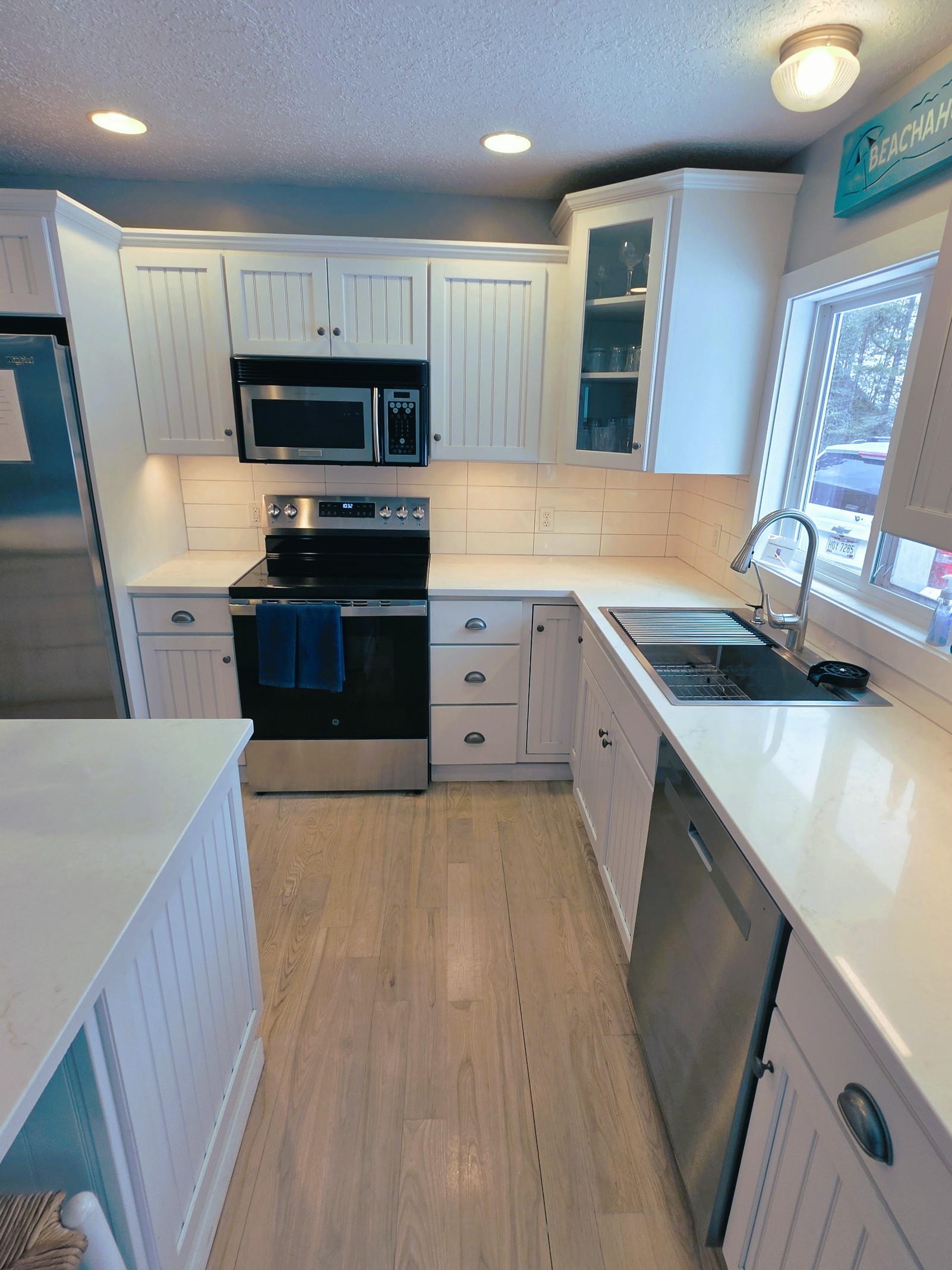 New kitchen Quartz counter tops and back splash 2026. Large bowl sink with glass wash and filtered drinking water