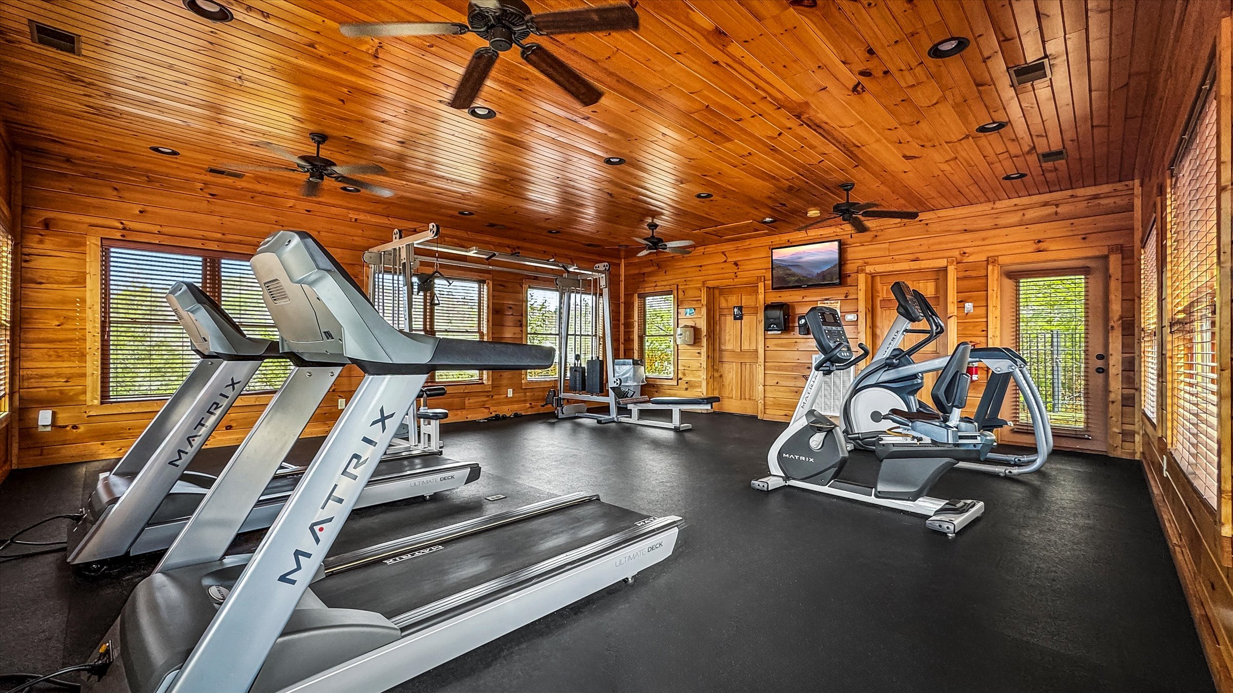 The well equipped fitness center is right by the resort pool