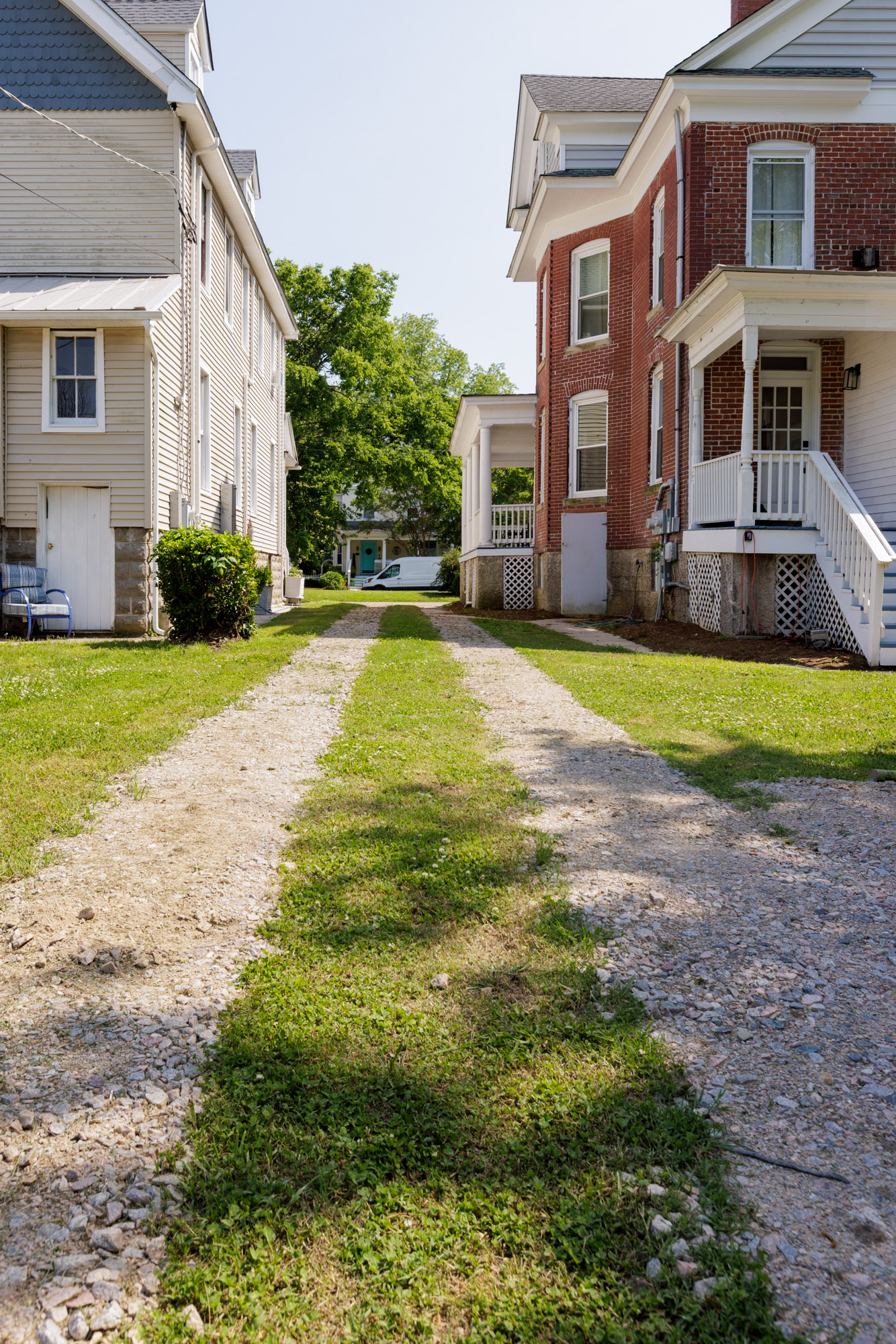 Driveway offers this unit parking and easy access to parking behind the unit's side of the home.