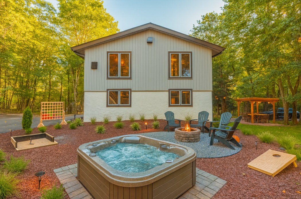 Unwind in the hot tub while the family gathers around the firepit, roasting s’mores and creating lifelong memories.