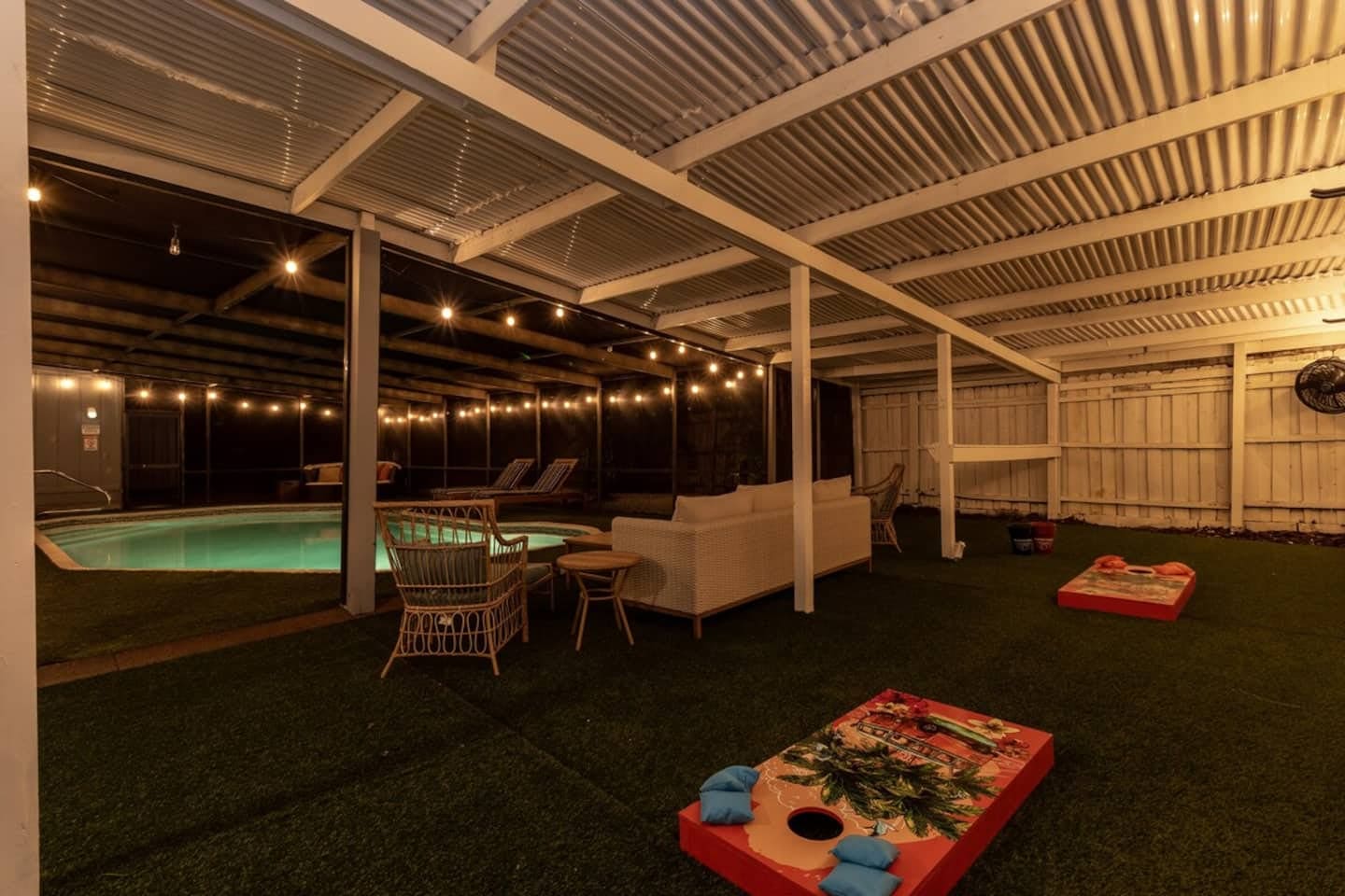 Screened Saltwater Pool with artificial non slip turf. Ping Pong, Bucket Ball, & Corn Hole.