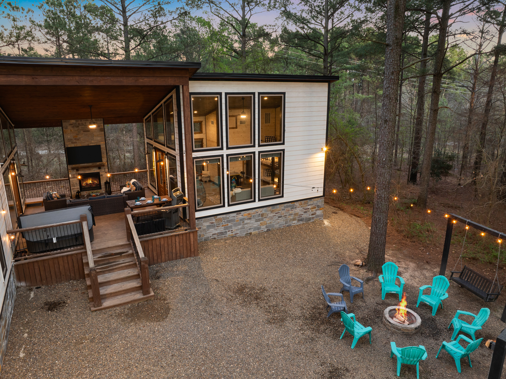 Your new favorite spot! This covered deck is a guest favorite because everyone can connect in one dreamy covered spot! The hot tub sits right here under full cover, so you can soak while the fireplace glows+ the game plays on the outdoor TV.
