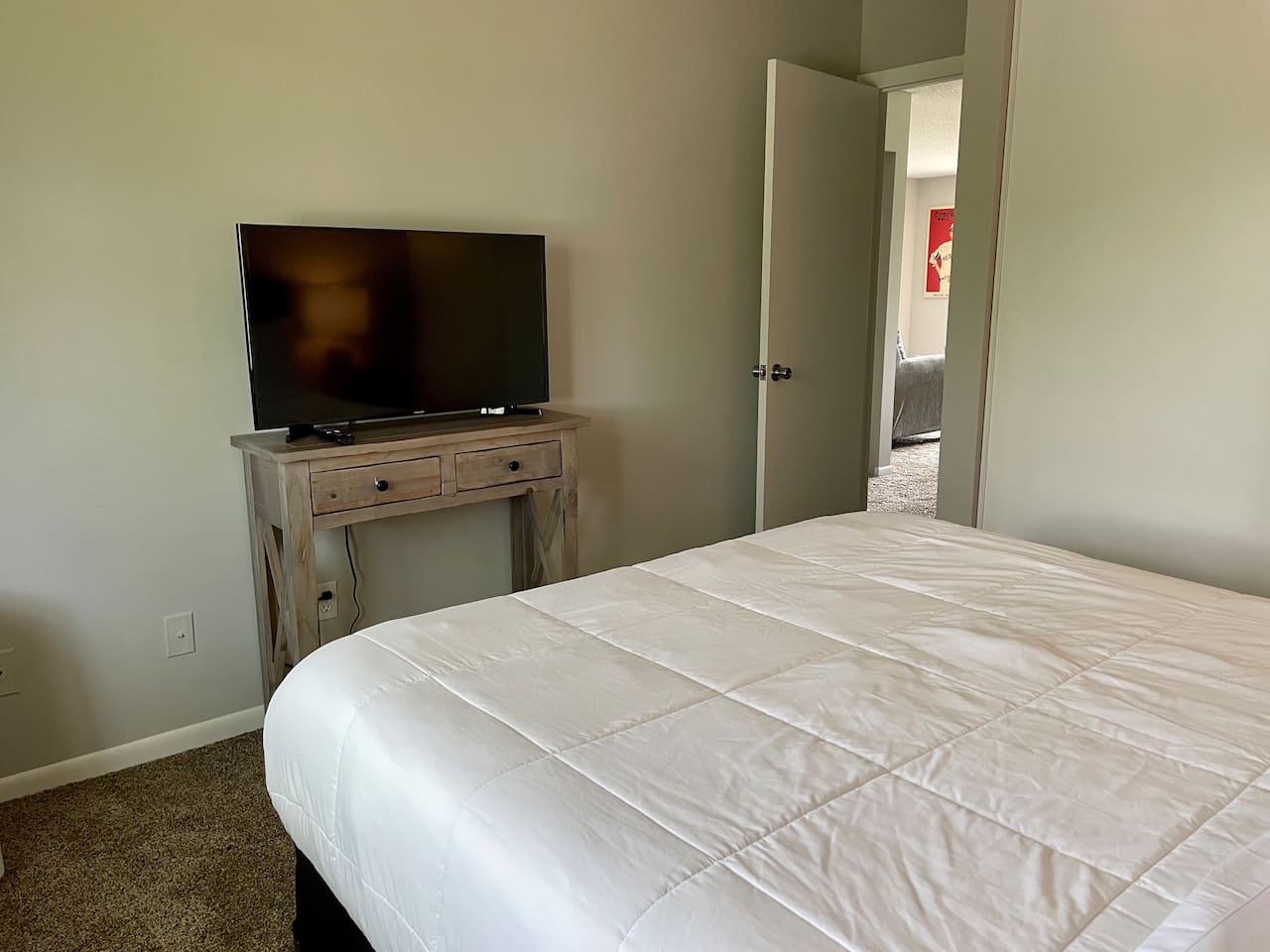 Bedroom 1 equipped with 43" smart tv.