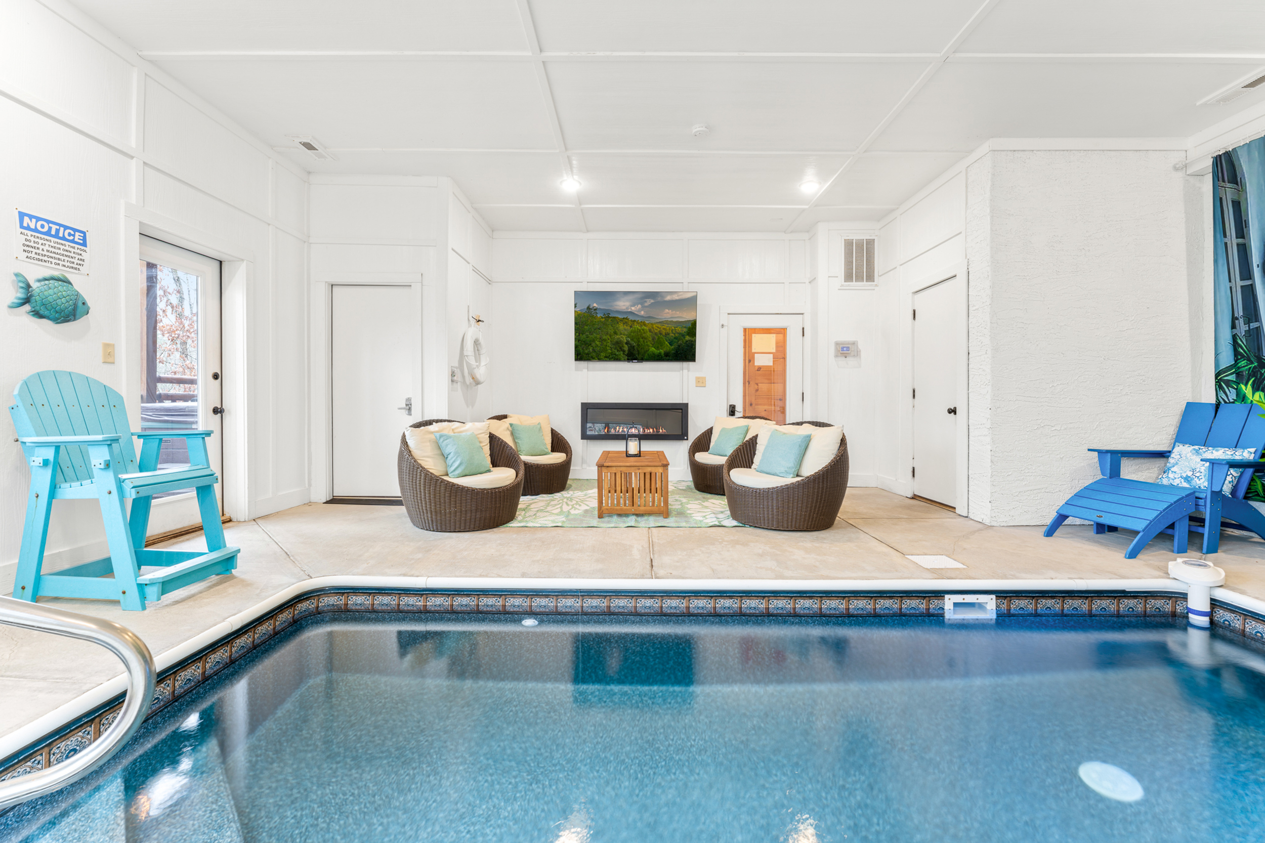[Pool Room, Third Floor] Your private indoor pool heated to 84° with fireplace, big‑screen HD Smart TV and Xfinity Stream - just outside the door is a private balcony with hot tub.