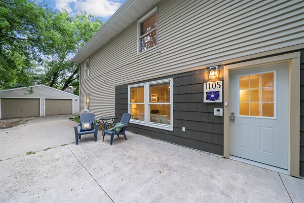 The exterior patio area and entrance to the lower Morning Glory Apartment. There is a 36" wide door for wheelchair accessibility.