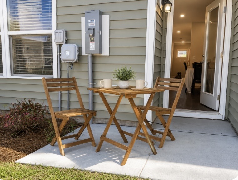 Step outside to your own private patio with a bistro set — the perfect spot for morning coffee or unwinding in the fresh coastal air after a busy day. ⭐