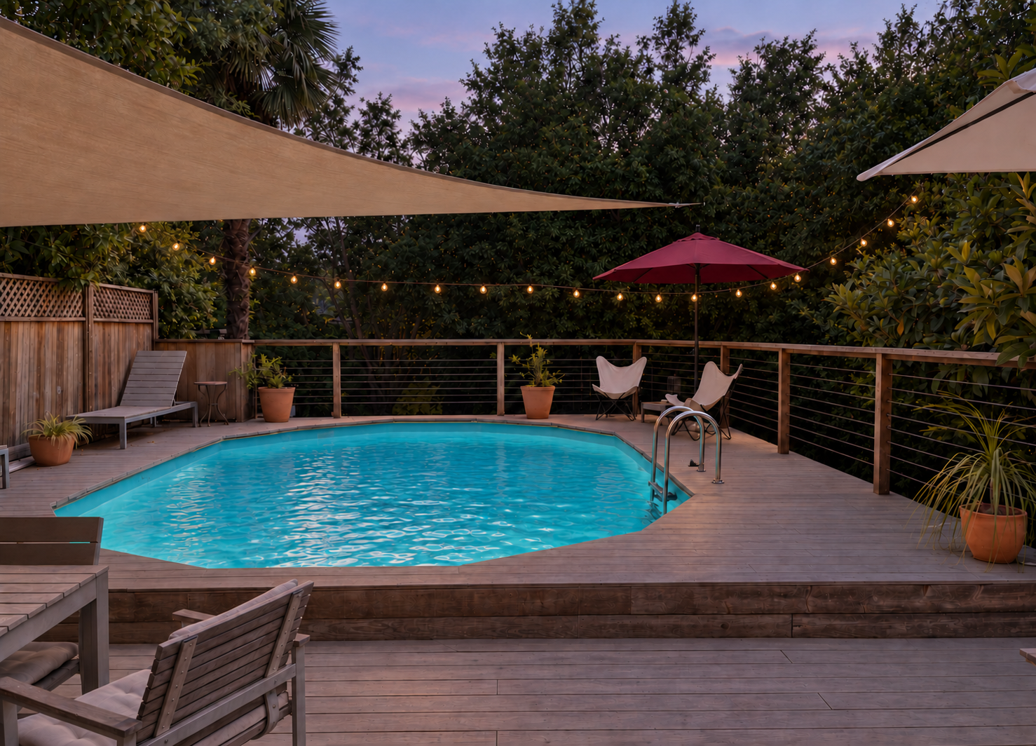 Pool and surrounding deck with outdoor seating.