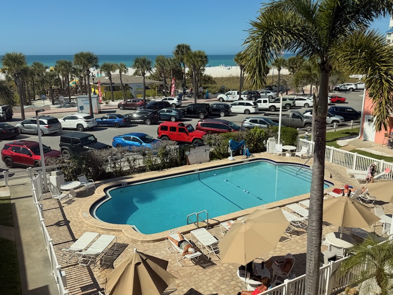 The heated pool is in front of the next building to the South.