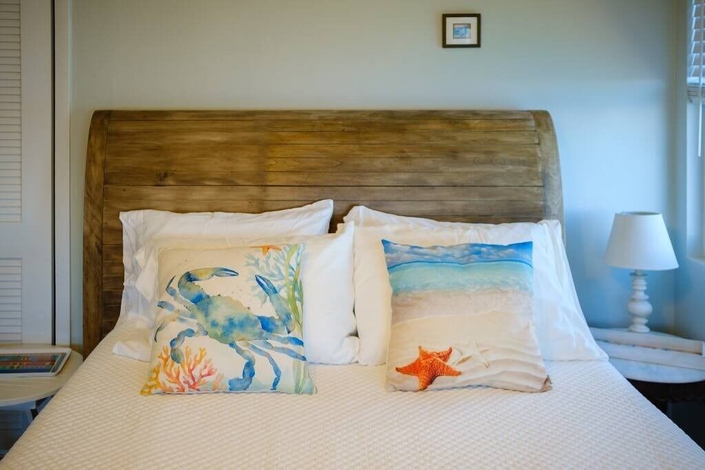 Comfortable queen bed with air conditioning.