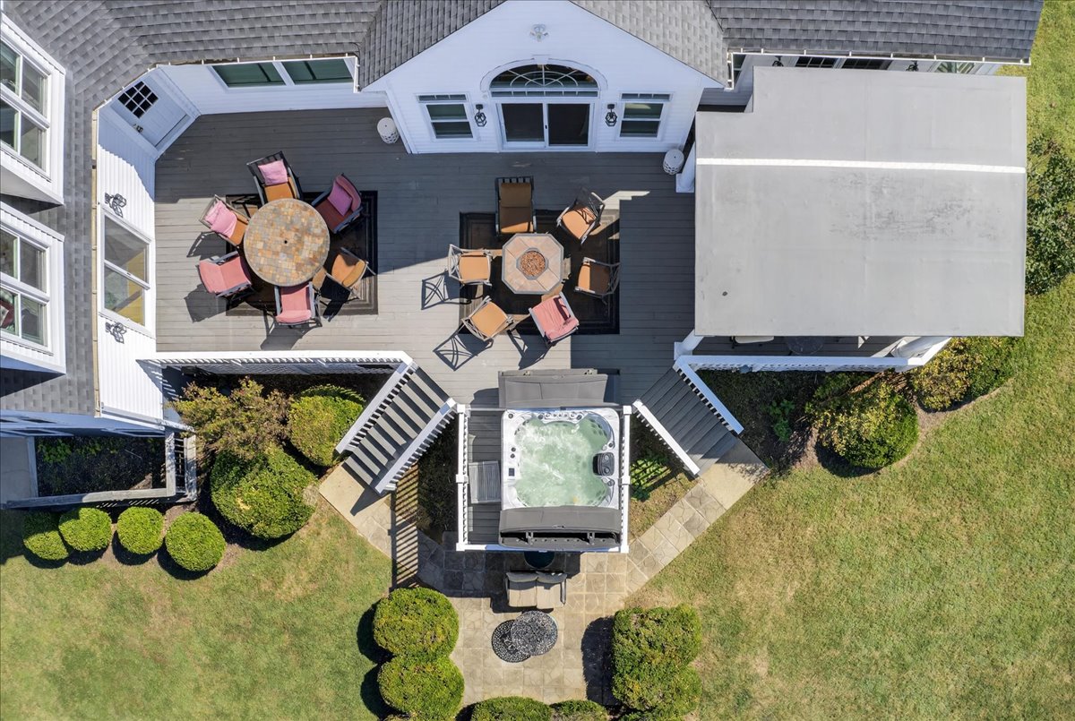 Cook, relax, and unwind outdoors with a grill, hot tub, and firepit for the whole family to enjoy.
