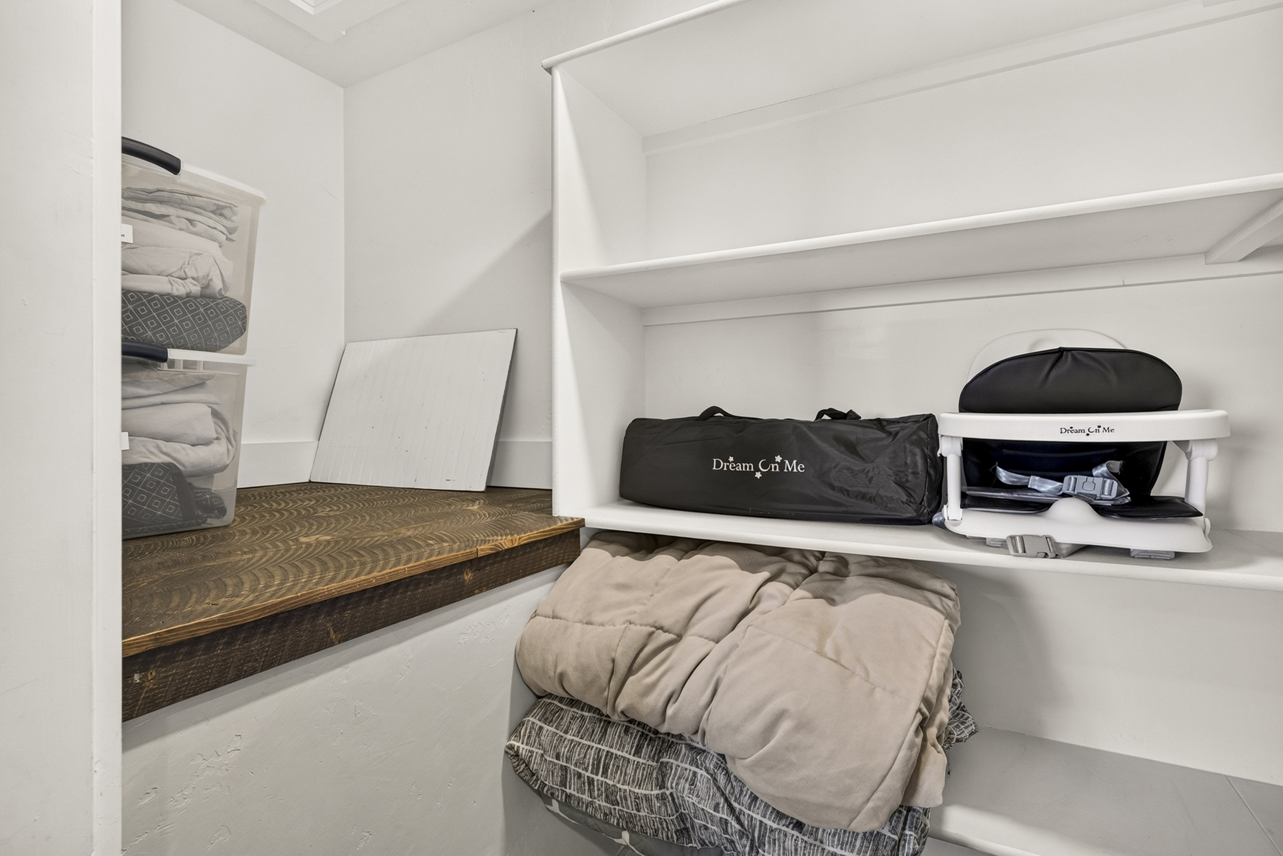 Upstairs closet in living room.
