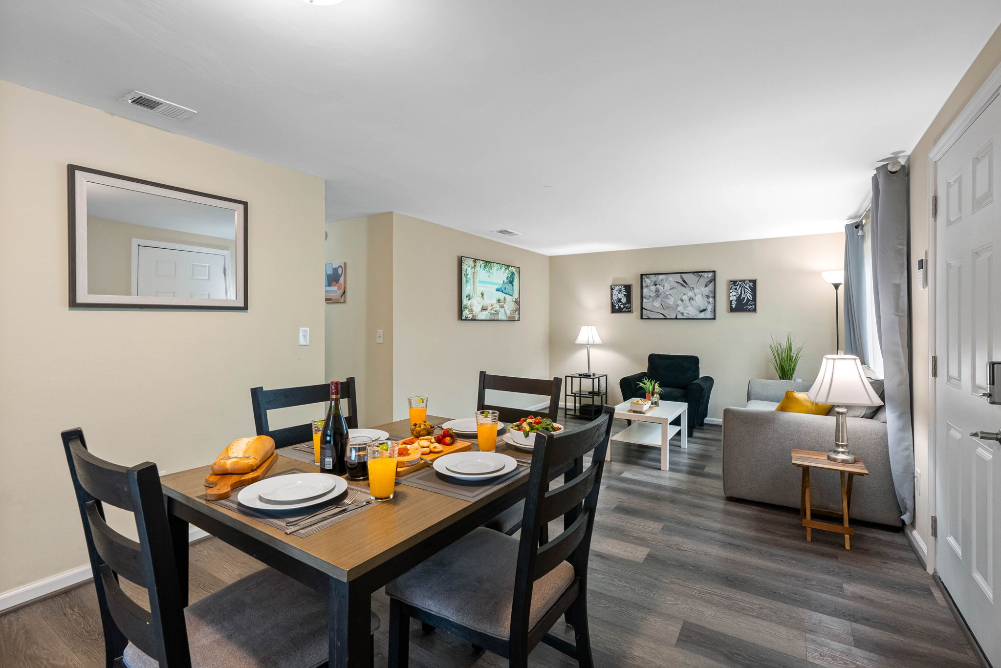 Gather, dine, and connect in this welcoming dining area that serves as a stylish centerpiece to the home’s open-concept living space.
