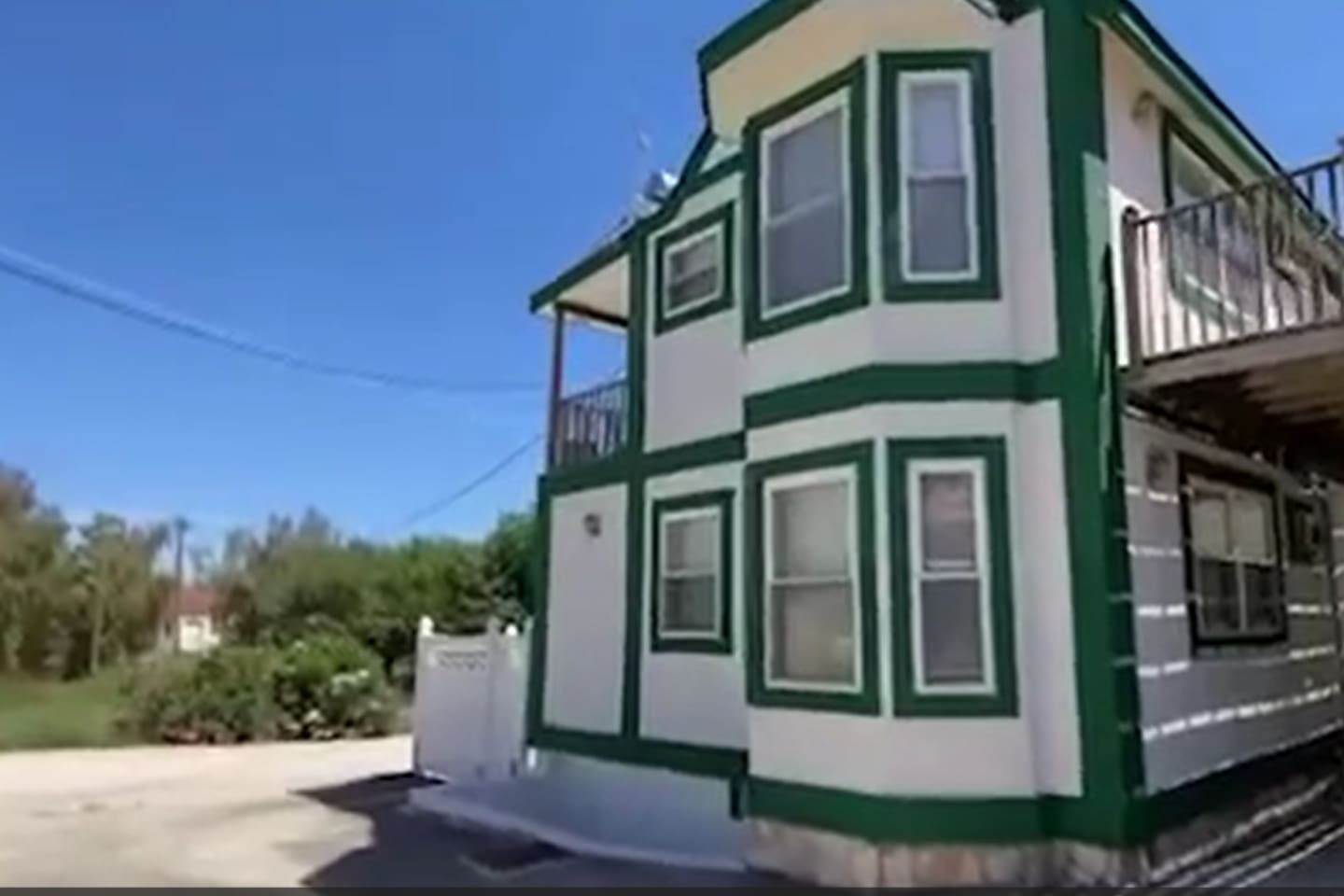 The studio is upstairs, the balcony on the right is shared with the neighbors. Both apartments may use the common balcony to hang wet laundry and to use the BBQ grill.  The balcony on the left is private for the studio apartment.