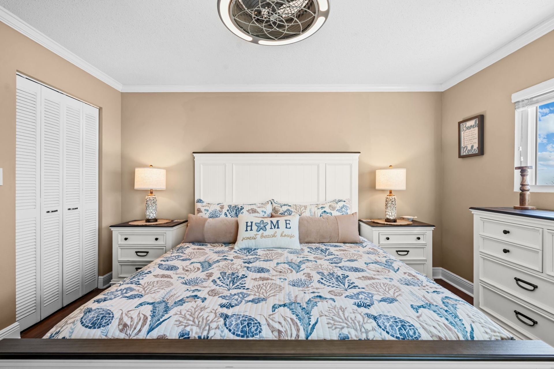 Master bedroom has a king bed, smart TV and ample clothing storage