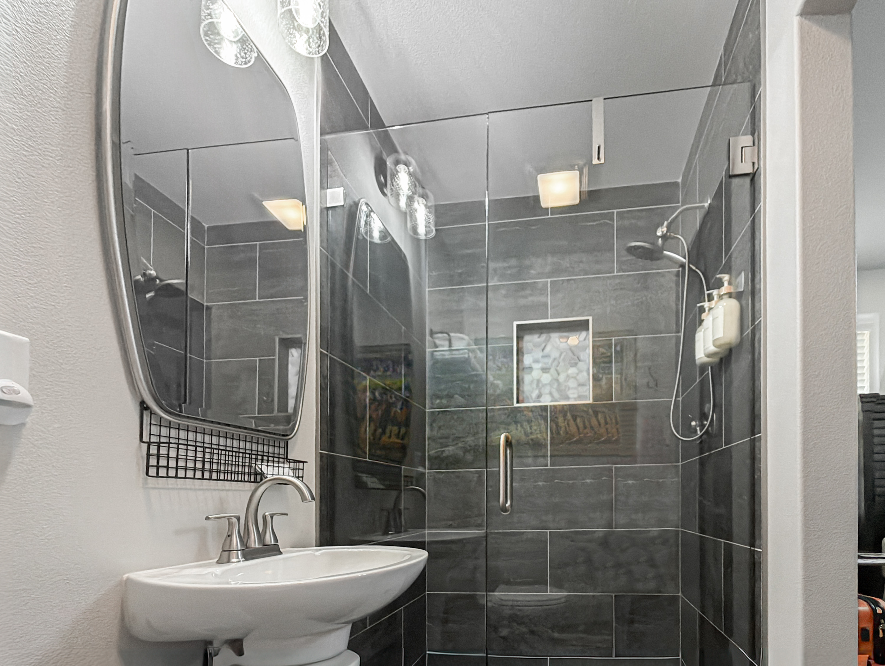 Take a long hot shower in the tiled walk-in — the end-of-day reset a full day in Hot Springs earns you.