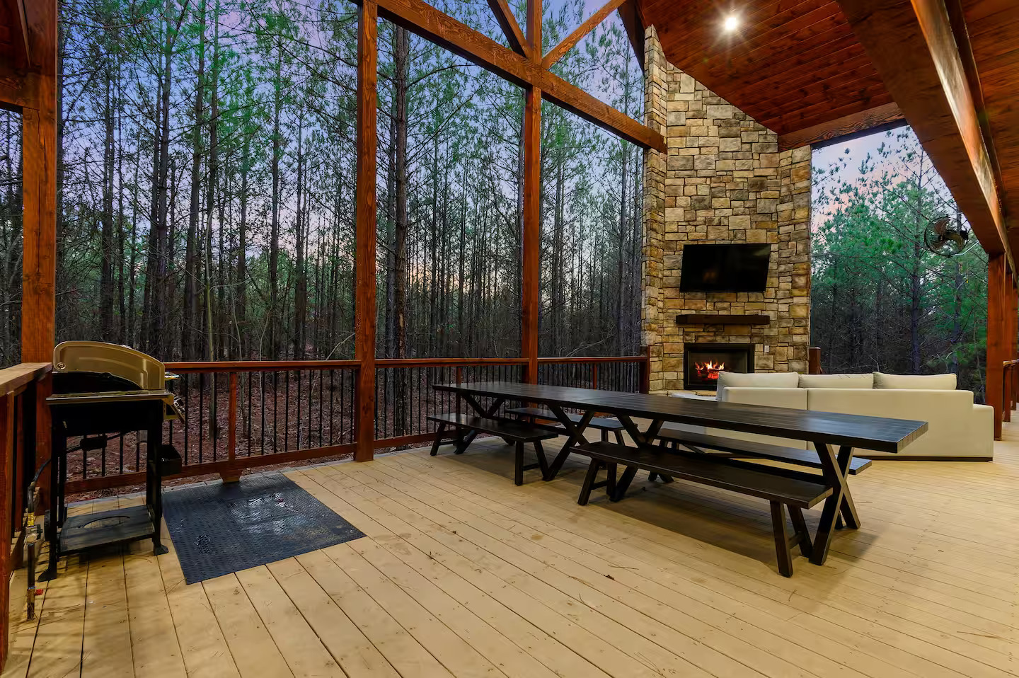 Step onto your private wrap-around deck surrounded by towering pines and crisp mountain air — the perfect setting for morning coffee, deep breaths, and connection with nature.