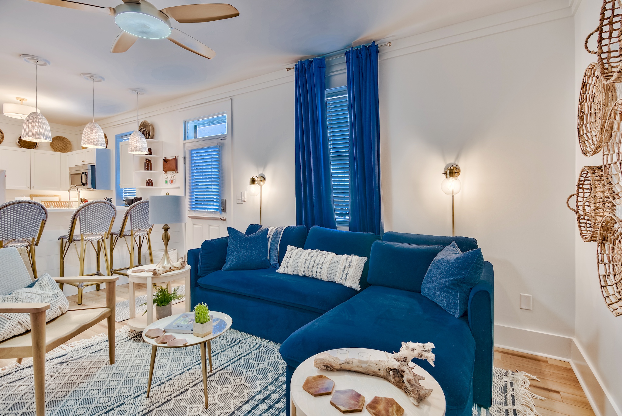 Living room with blue sectional seating