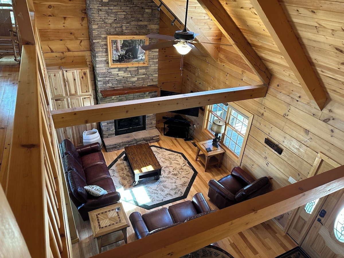 Living room and propane fireplace from the 2nd floor loft