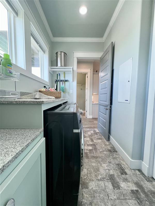 Crystal Paradise Laundry: Convenient laundry area with modern washer and dryer hookups.