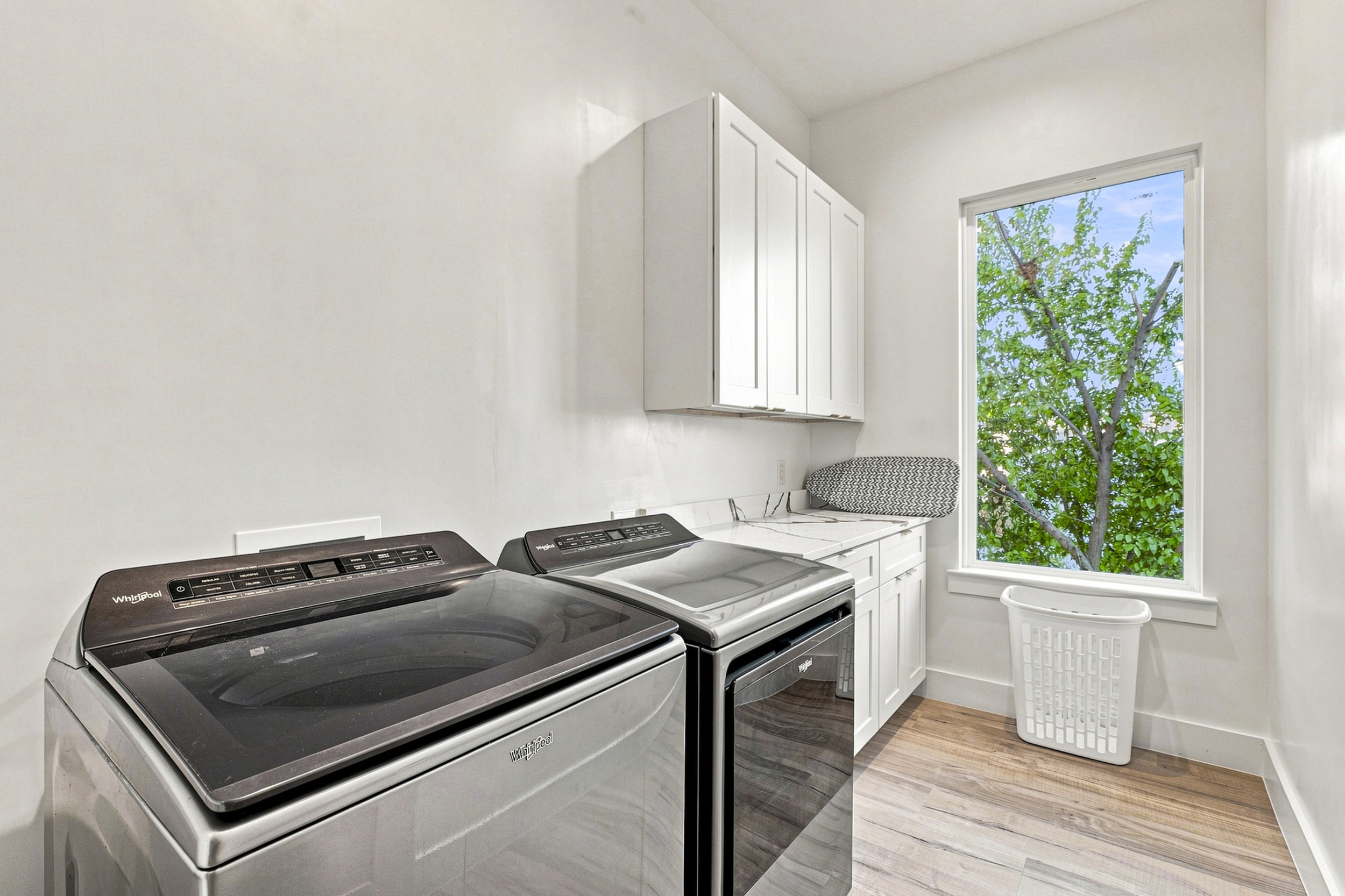 Sleek appliances and a bright view make washing a breeze in Dallas!