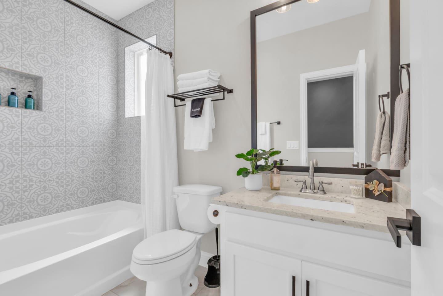 Guest bathroom with vanity, storage, and modern finishes.