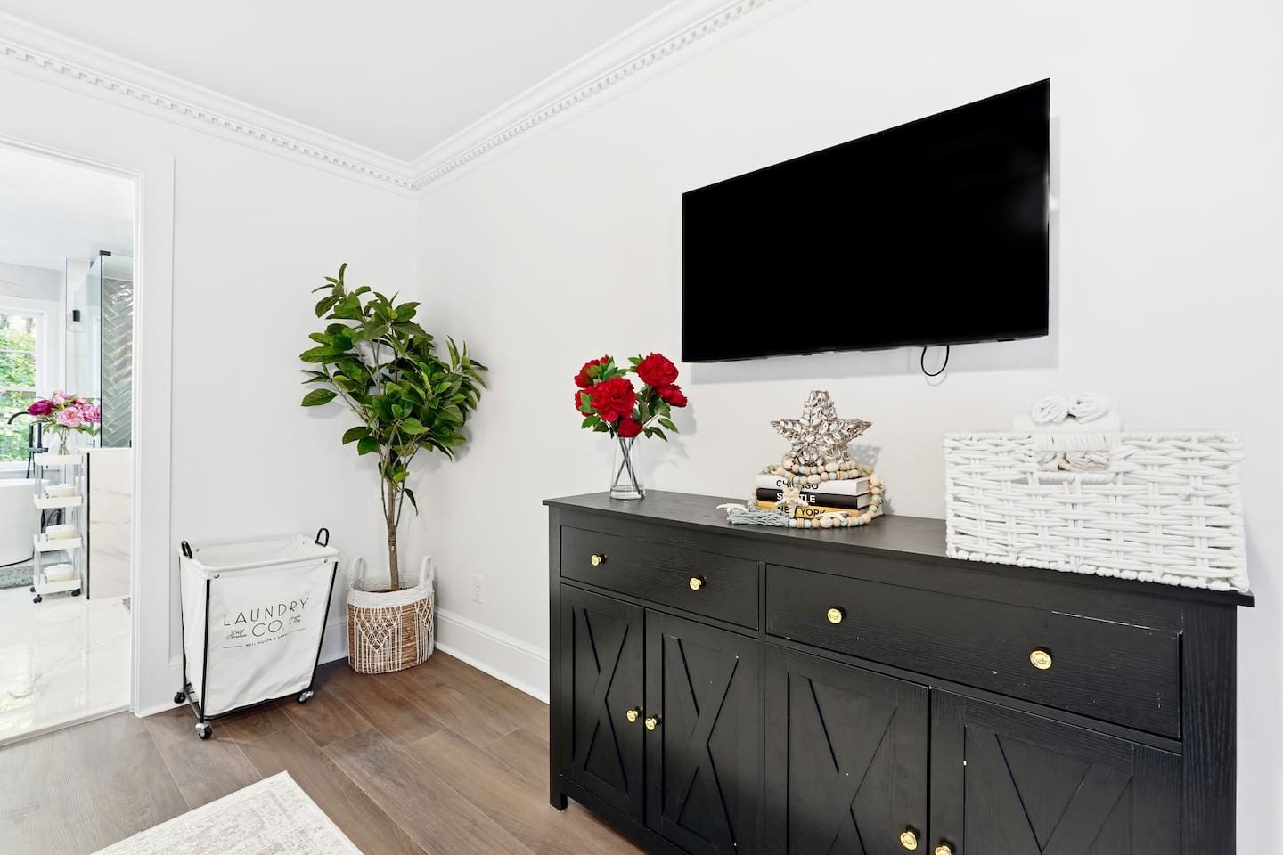 Spacious main-level master bedroom featuring a king bed, a Roku-powered Smart TV, and conveniently located to the left as you enter the home. This room includes 2 full-body towels, 2 washcloths, and 2 hand towels for your stay.