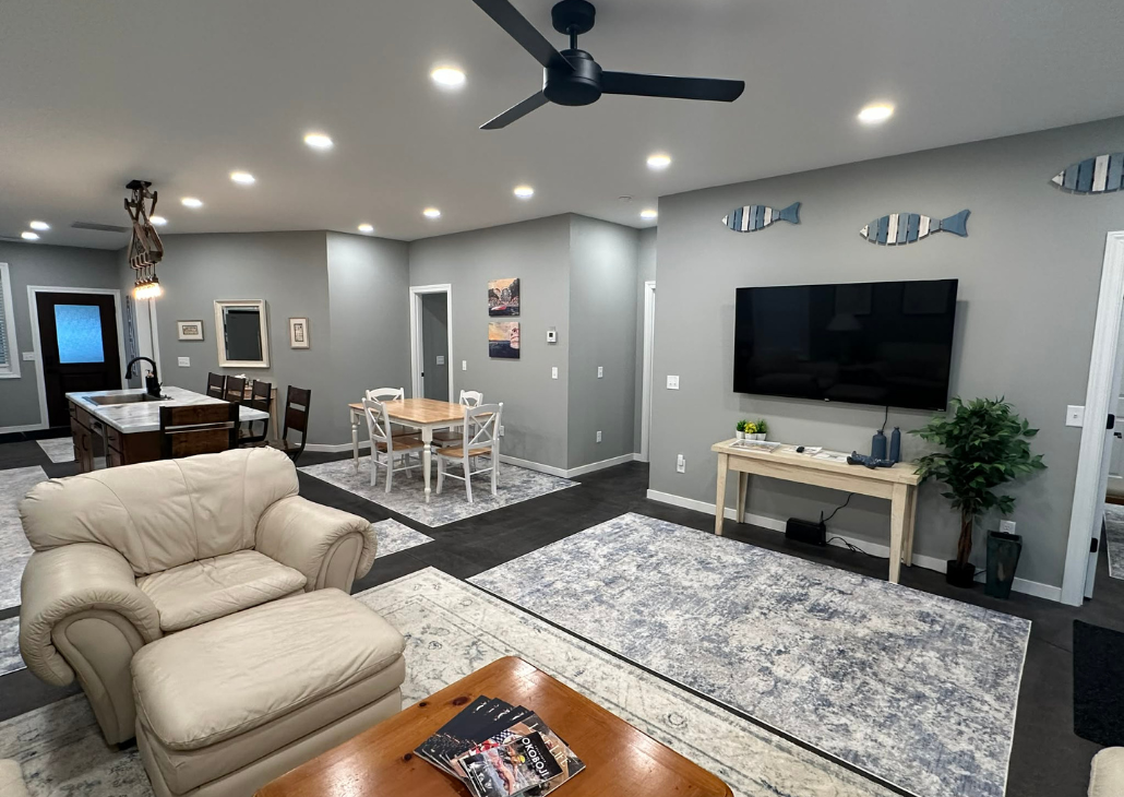 NEW HOUSE: Smart tv plus ceiling fan to keep you cool.