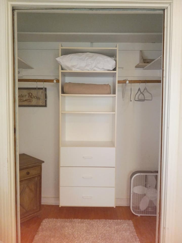 Closet space includes generous clothing hanging, shelf and drawer space for short or long term stays.

Extra, sheets, pillows and blankets are provided  in each closet.