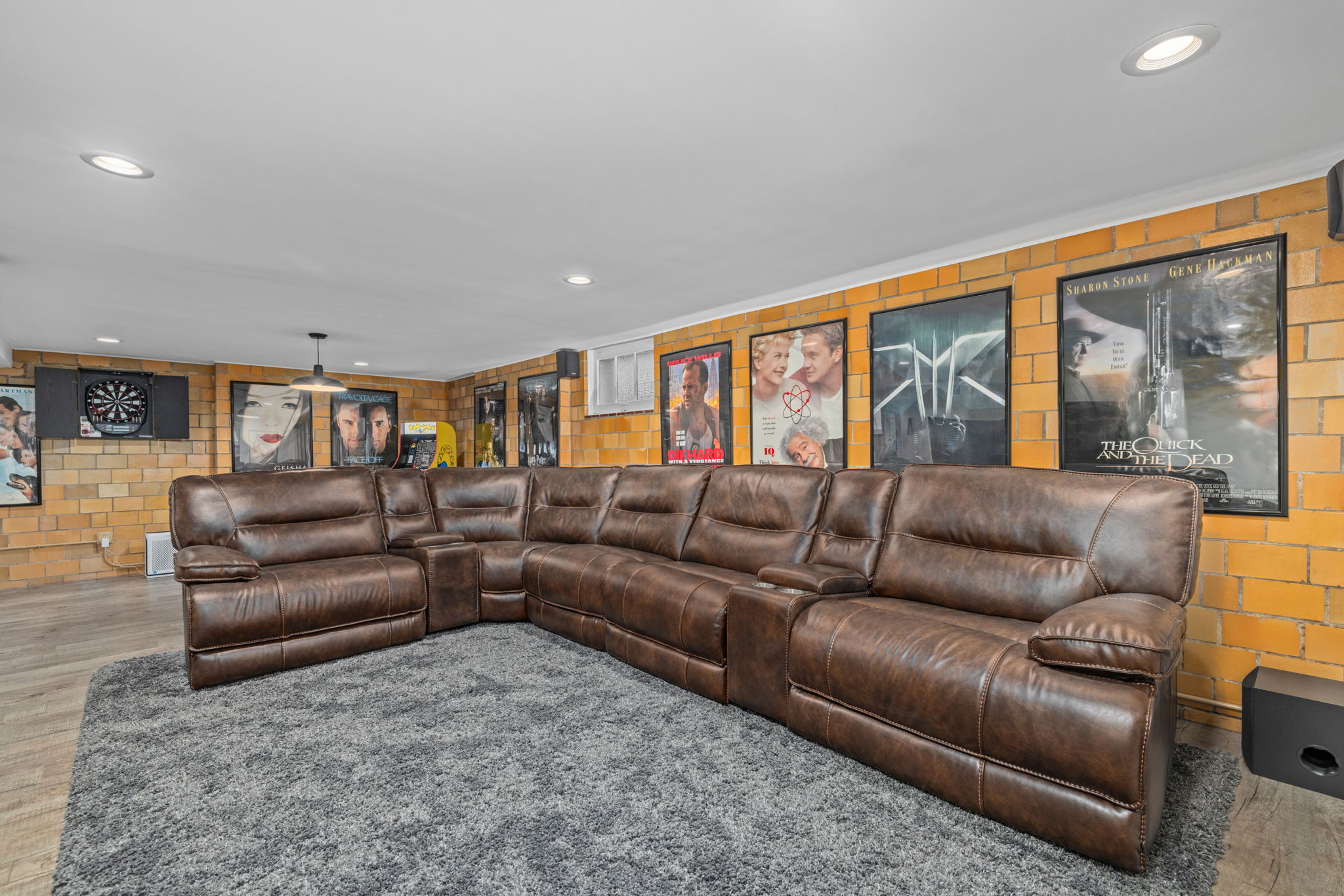 Lower level family room. Enjoy our movie theater themed space to relax and spend time with the family.  Three recliners, extra bean bag.