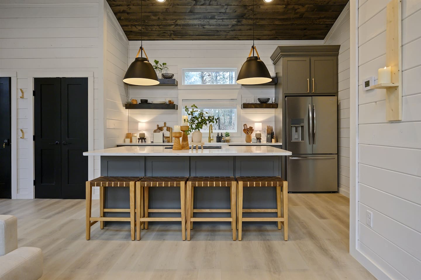 Whip up a romantic meal in the fully equipped kitchen with modern amenities and a Nespresso machine with frothier