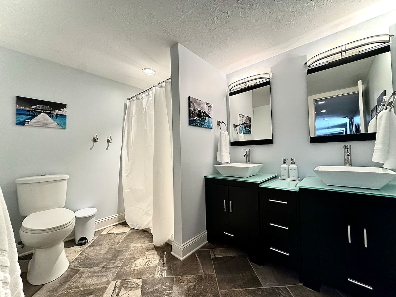 Spacious double vanity and walk-in shower in the Garden Level Double Bathroom.