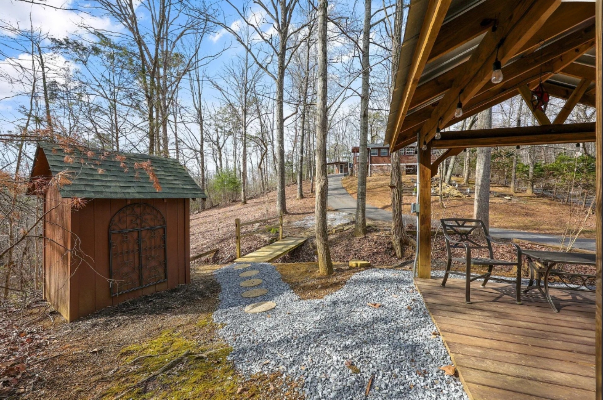 View of house from detached covered deck