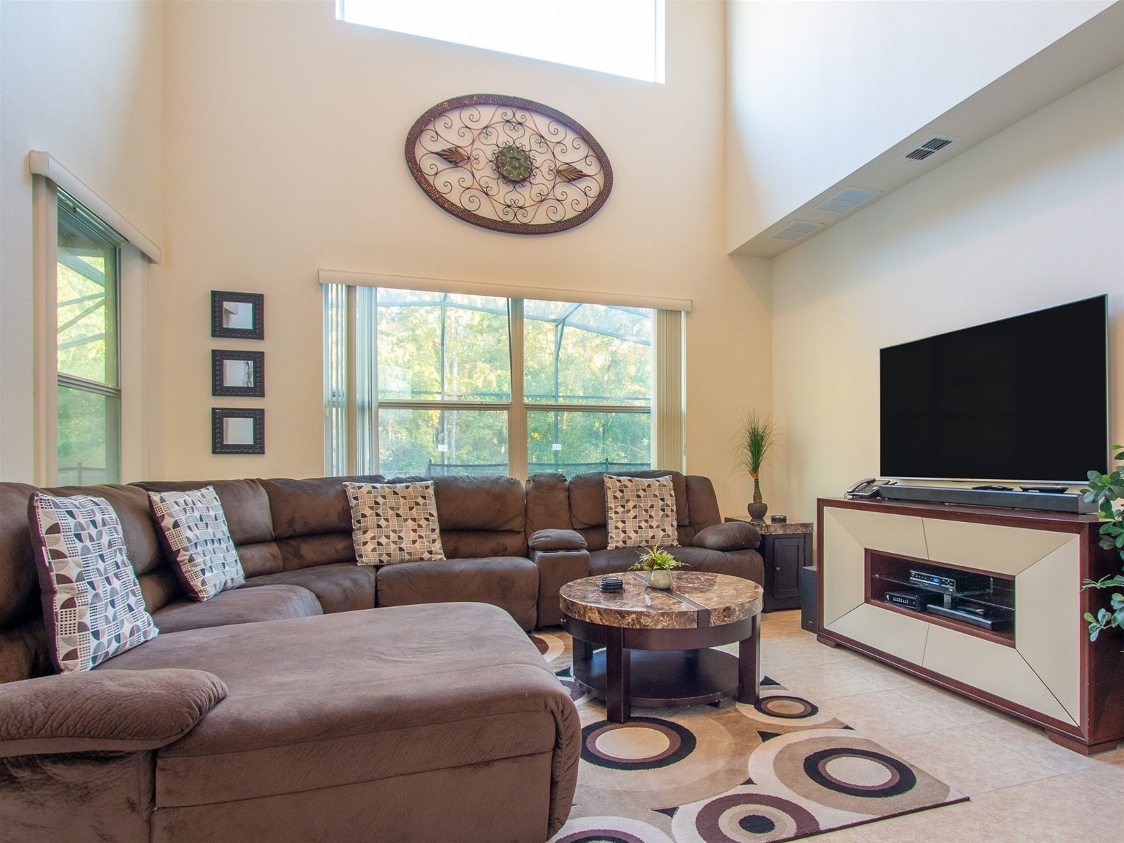 Comfortable U-sectional, entertainment center with large screen TV, expanded cable included!