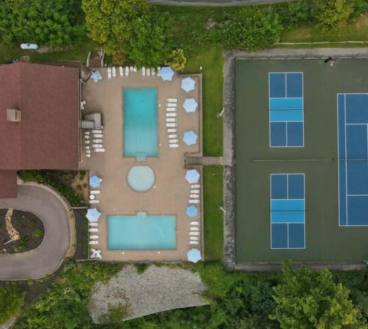 1 of 3 resort pools and tennis courts. Free for guests.