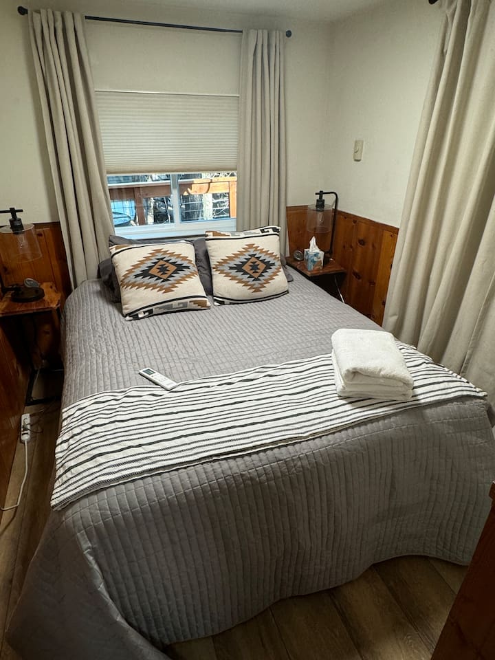 Curl up for a good night's sleep in this first floor bedroom, featuring an electric blanket, snugly comforter and plenty of pillows. No fighting over the thermostat here - each bedroom has it's own thermostat with both heat and air. 