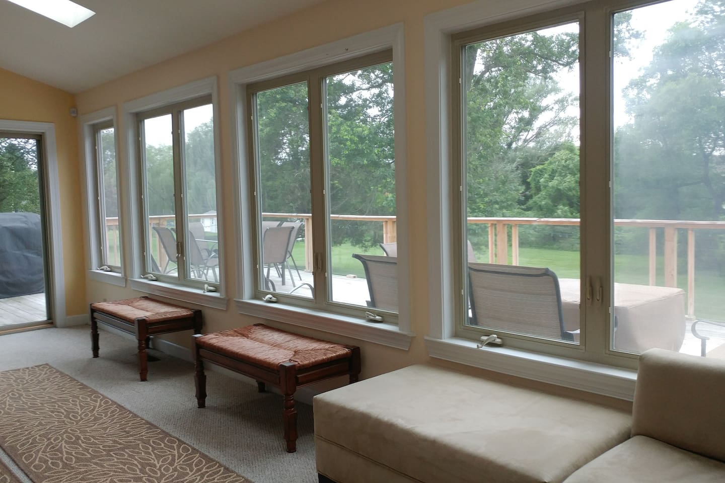 Looking onto deck and yard beyond.
