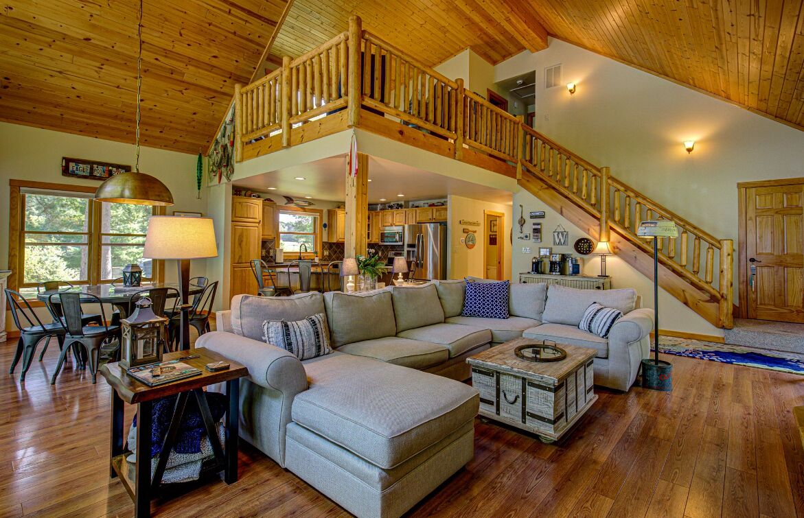 Open concept living w loft above.