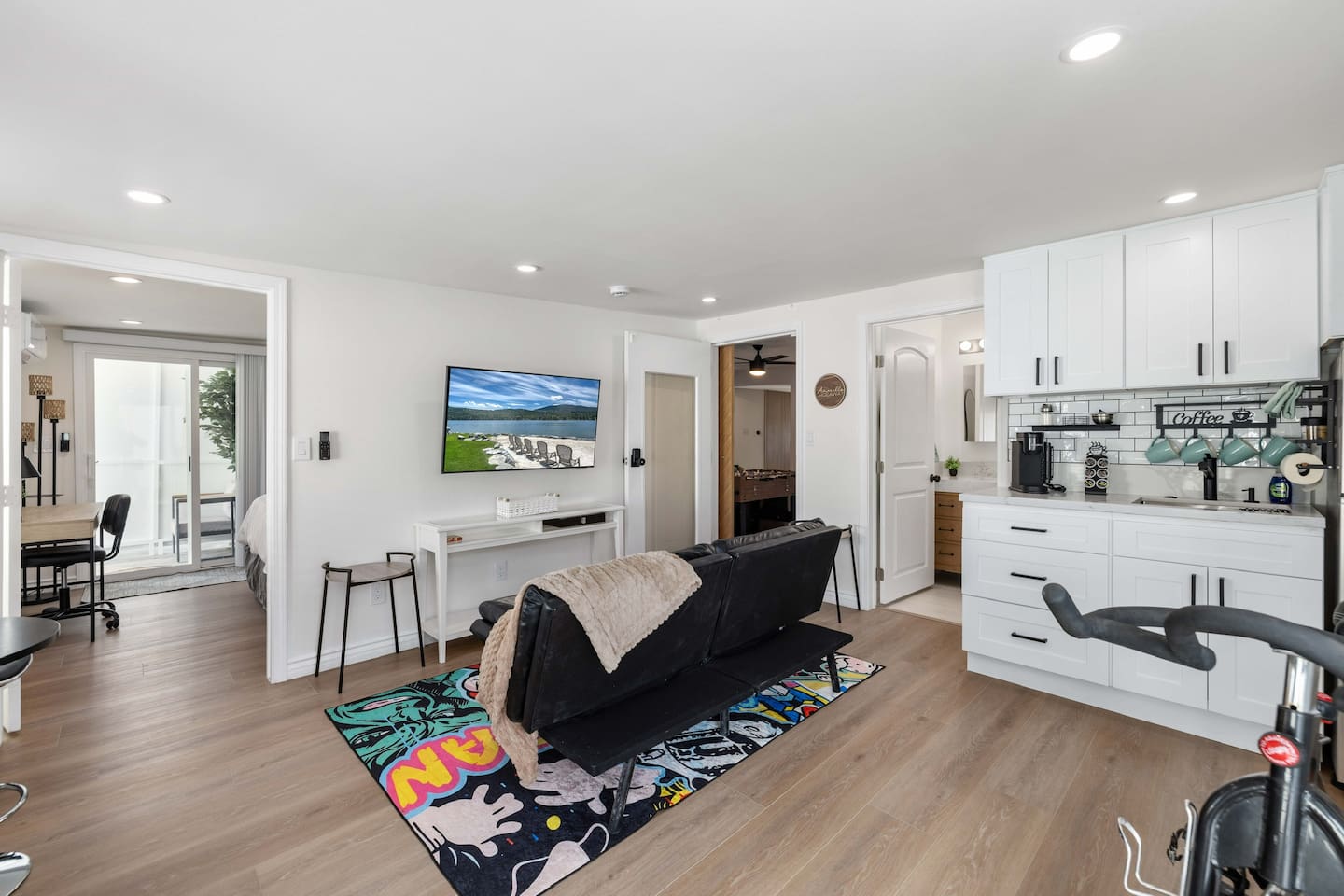 Game room w/ attached Bedroom 3 and doorway to Living room. Attached Bath and kitchenette.