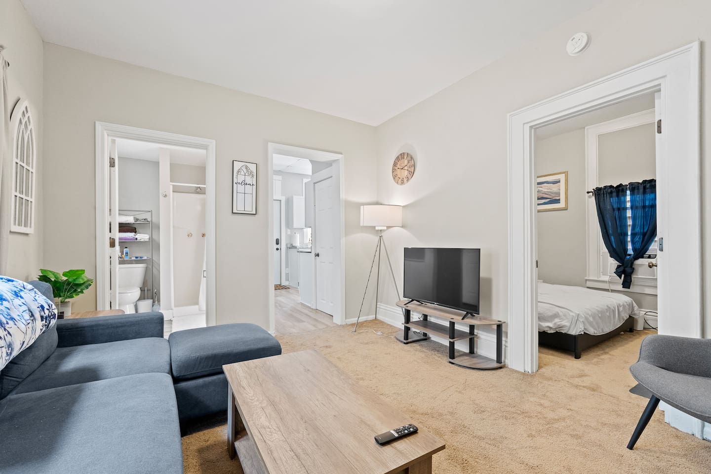 Enjoy the serene ambiance of the living room, complete with a TV and stylishly arranged seating.