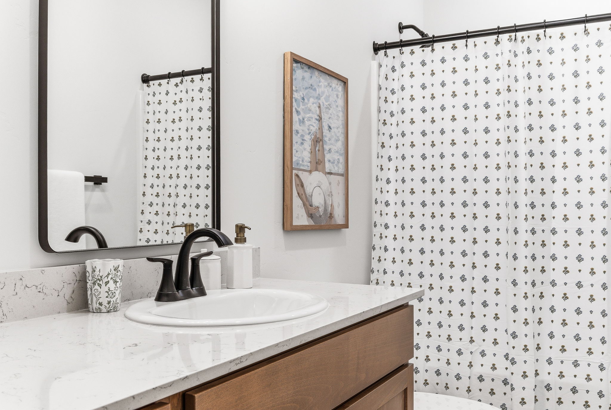 Bright lighting, plenty of counter space, and modern finishes make getting ready effortless, whether you're heading out or winding down.