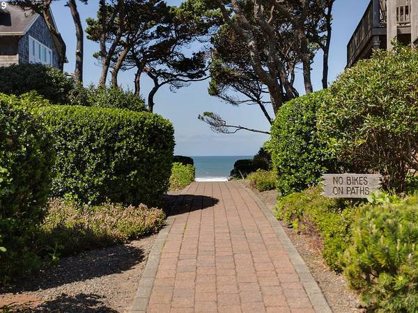 Stroll through the Bella Beach neighborhood, where every path seems to lead straight to the beach.