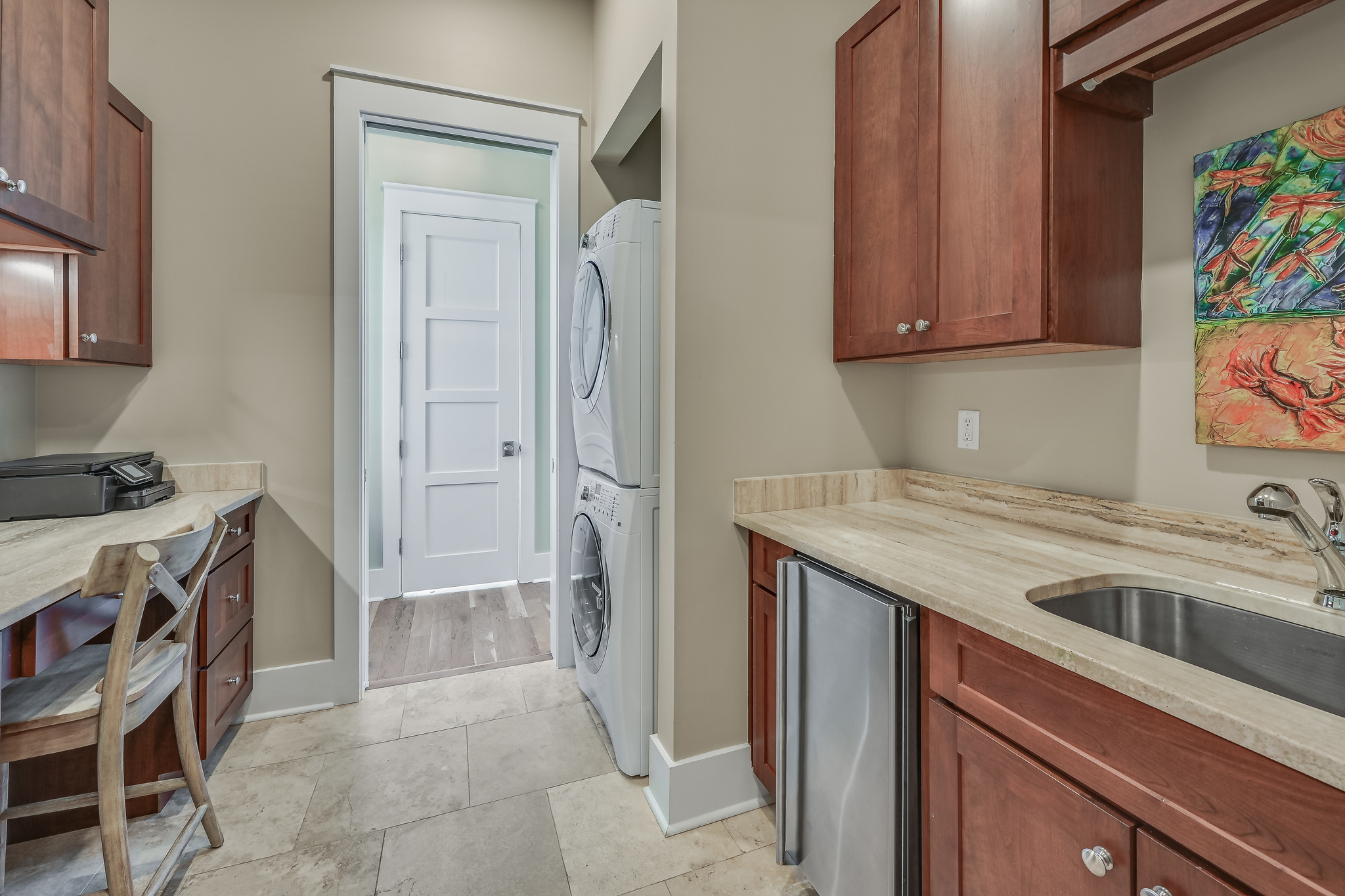 Main Floor Laundry with desk and ice maker