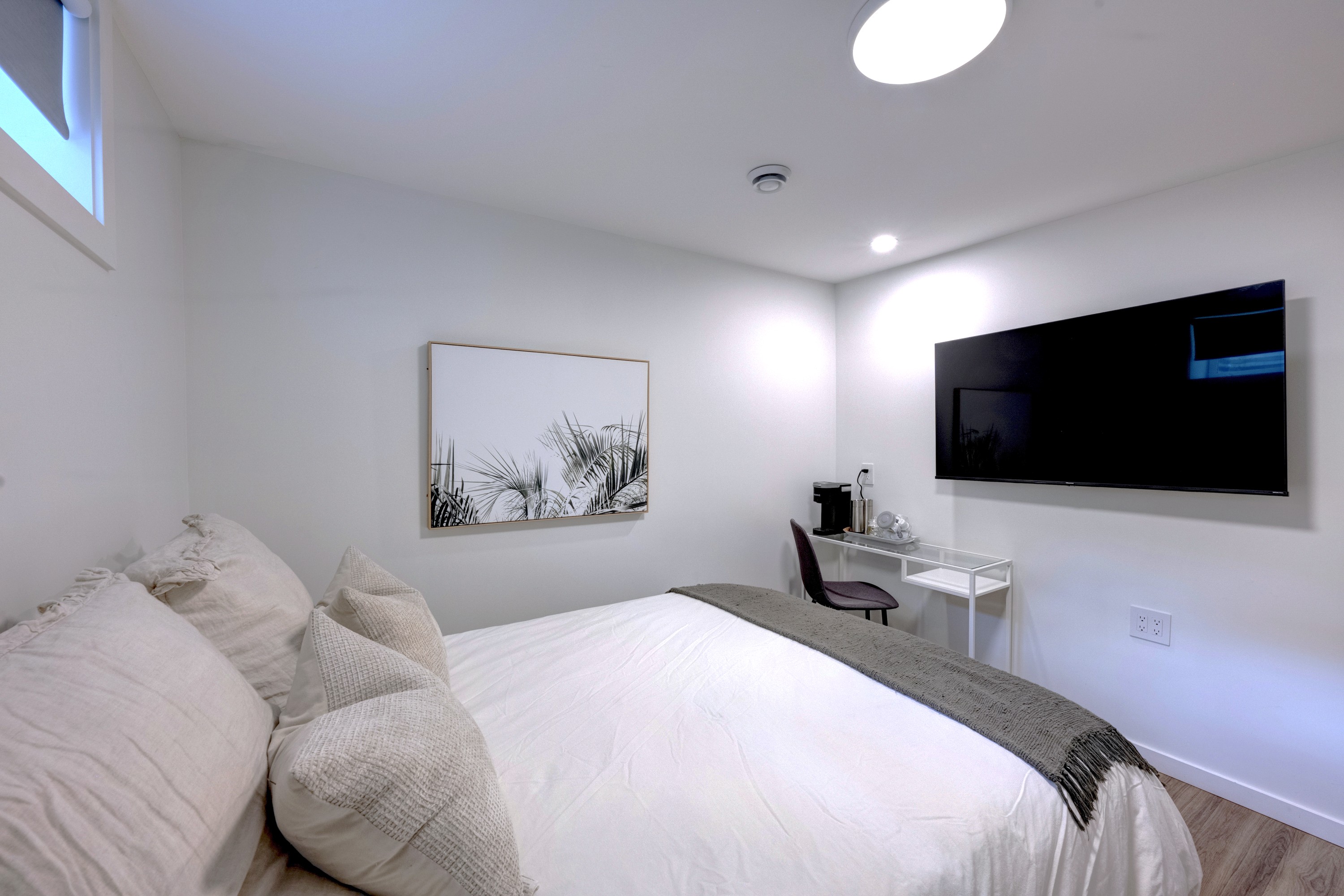 Bedroom #2 with a TV with streaming apps for your favorite shows and workspace