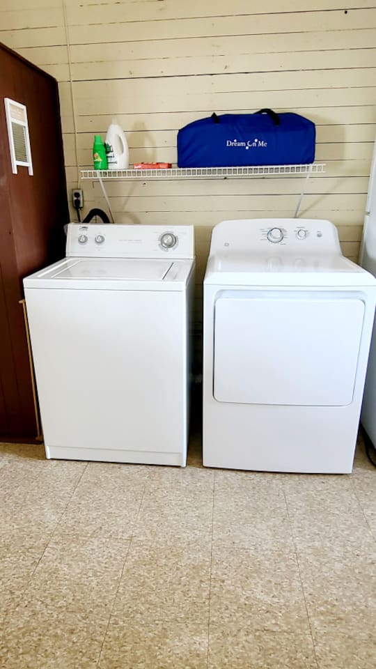 Washer and dryer located on second floor back hallway