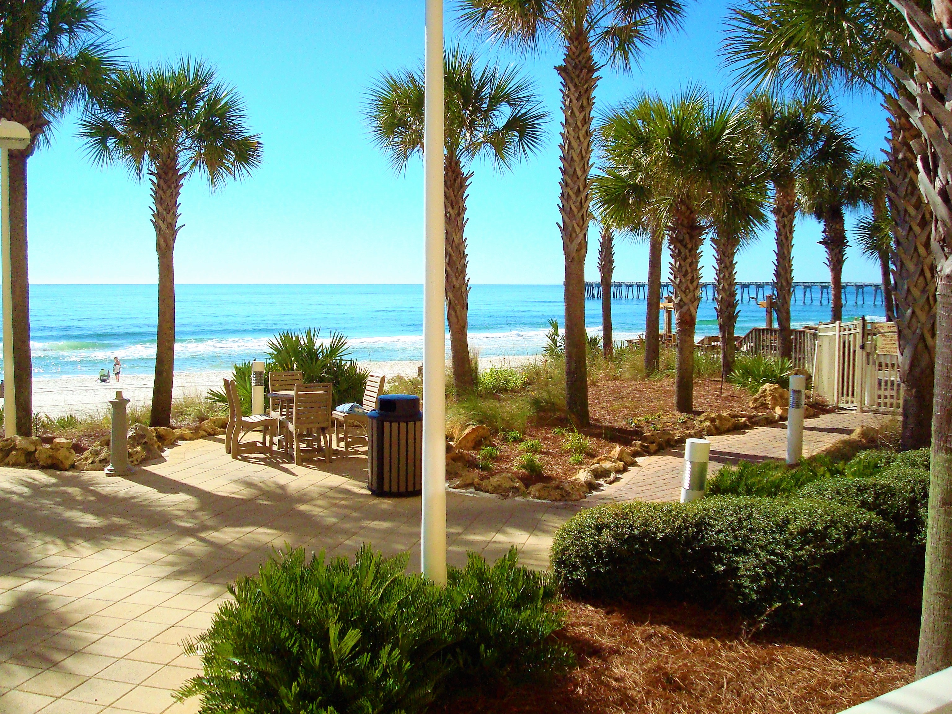 Calypso Resort manicured landscaping with the beach and Gulf in the background