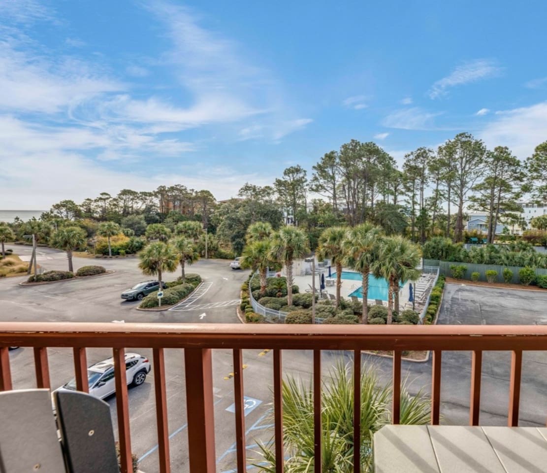 Balcony view of the pool and grounds